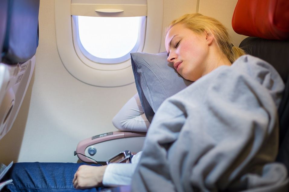 casual caucasian lady napping on uncomfortable seat