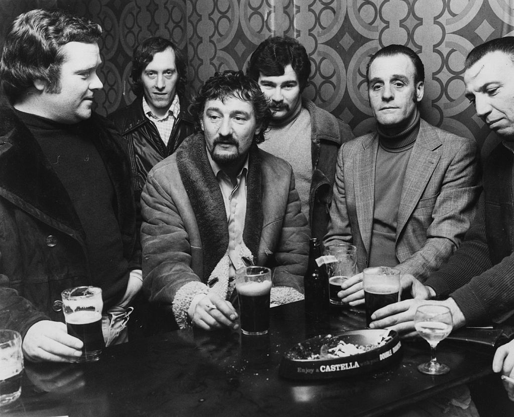 Smithfield workers looking miserable as they have a pint or two in the public bar