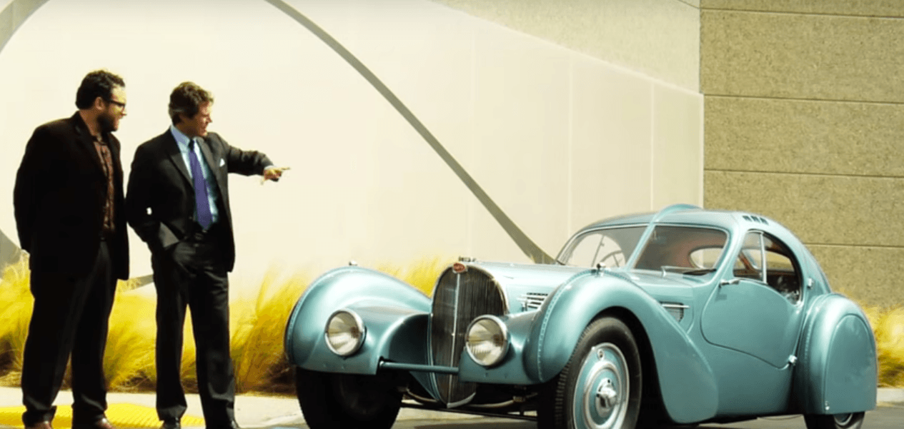 Two men discussing a 1936 Bugatti Type 57S