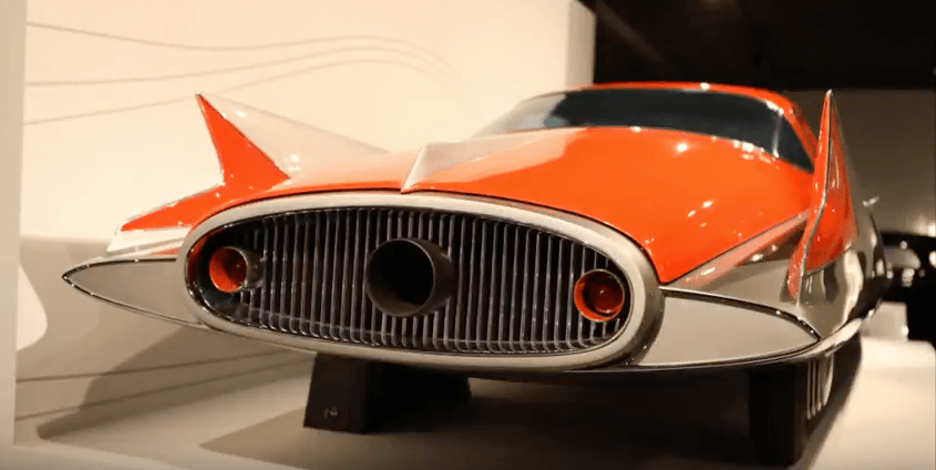 A close up view of a 1955 Chrysler Streamline X on display