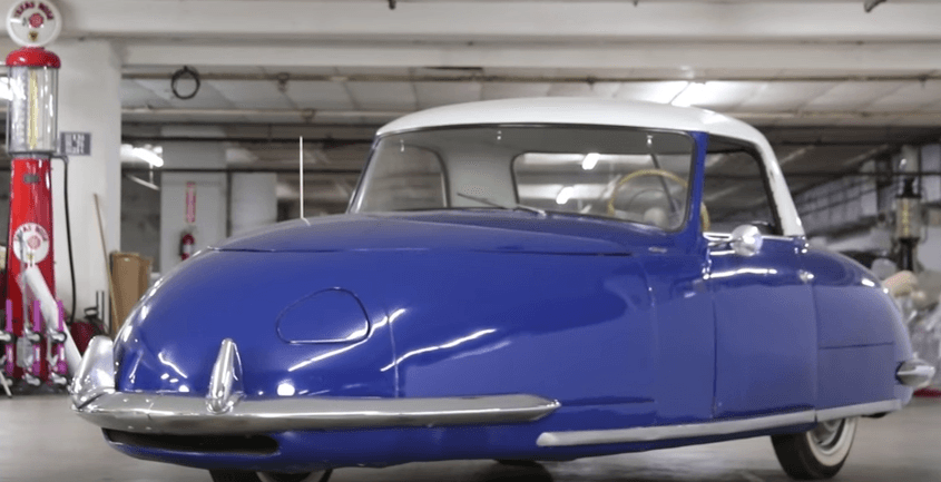 Blue Davis Divan on display in a garage