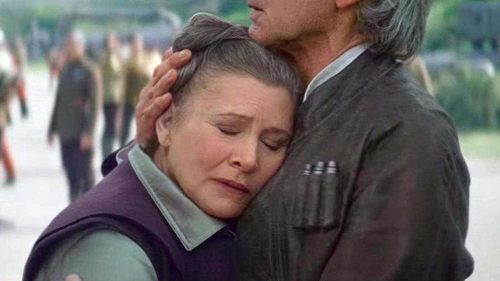 Leia and Han hugging as she leans against him.