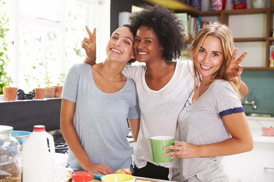 Three Female Friends Enjoying Breakfast