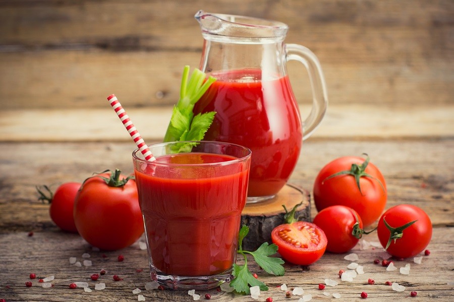 Tomato juice in the glass and jug