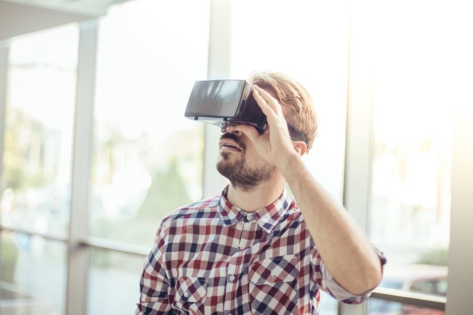 man using virtual reality headset