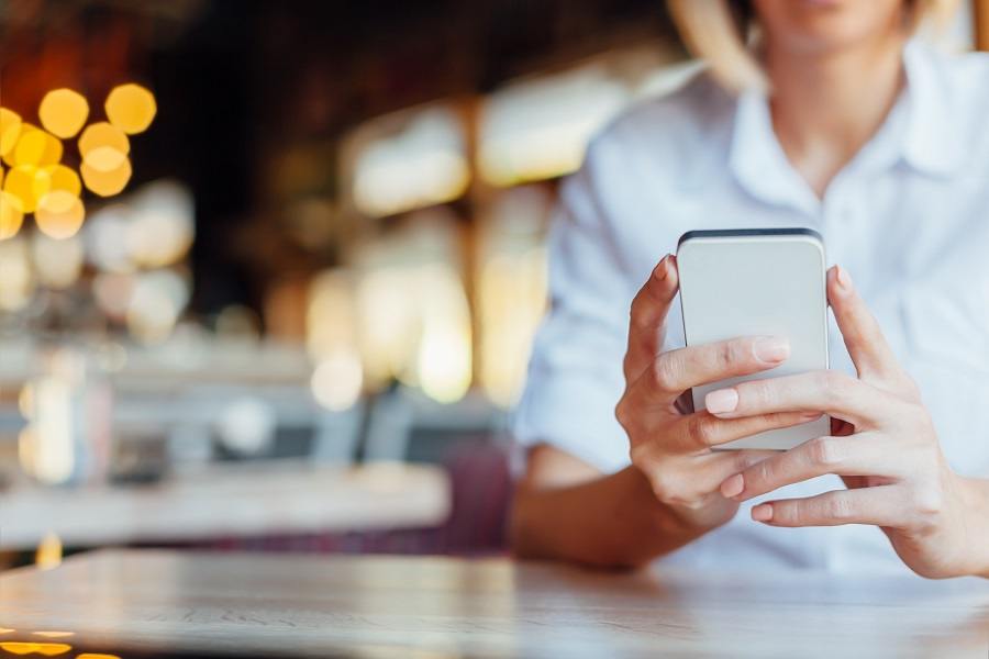 Woman holding smartphone