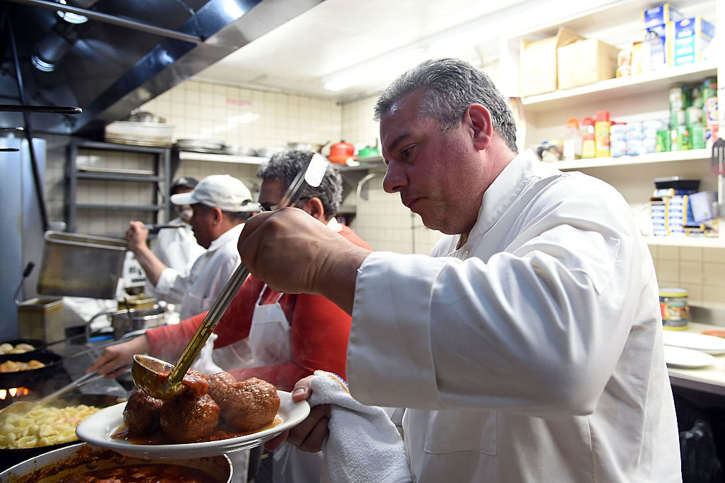 chef serving meatballs