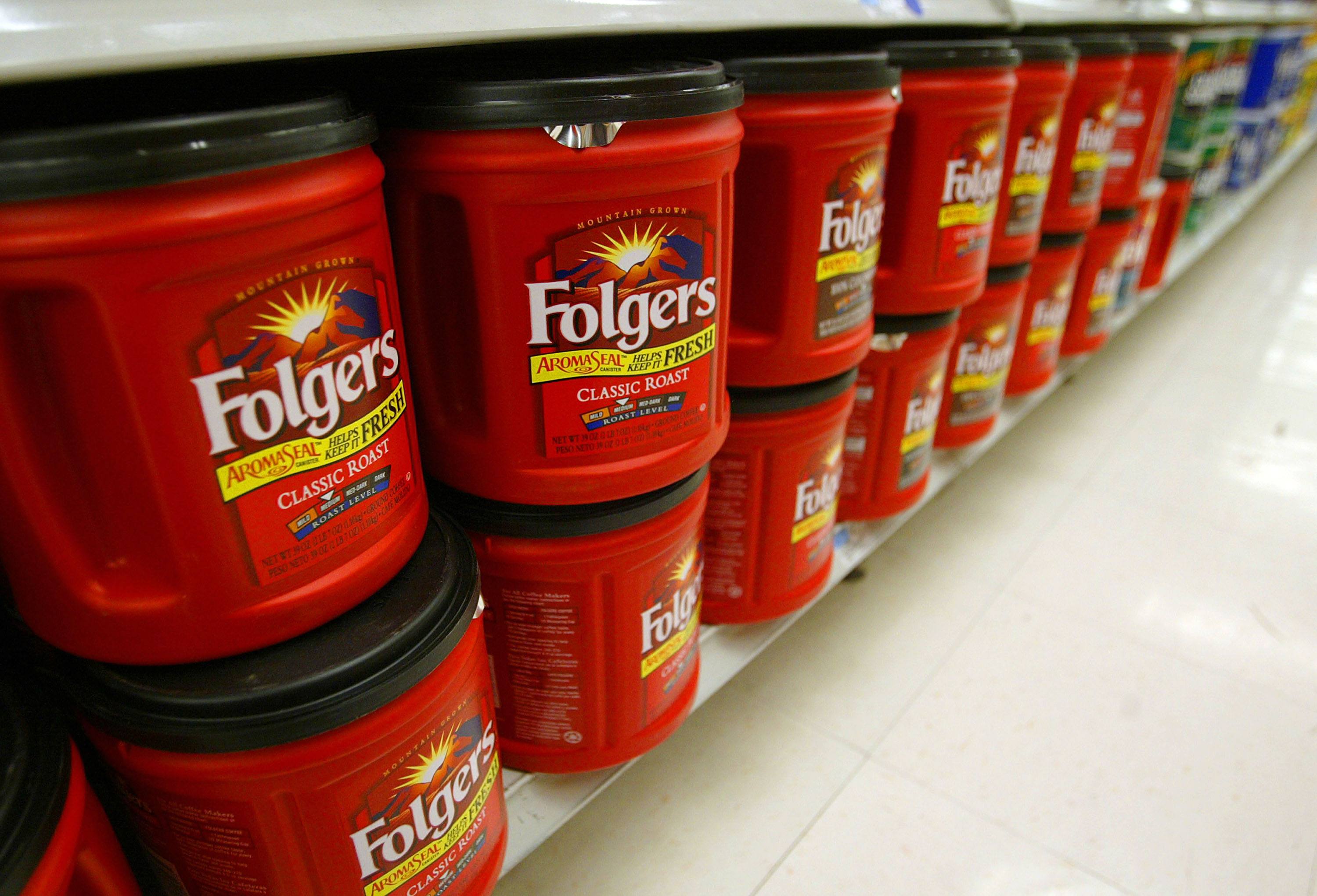 Folgers coffee, the best part of waking up, is seen on a grocery store shelf