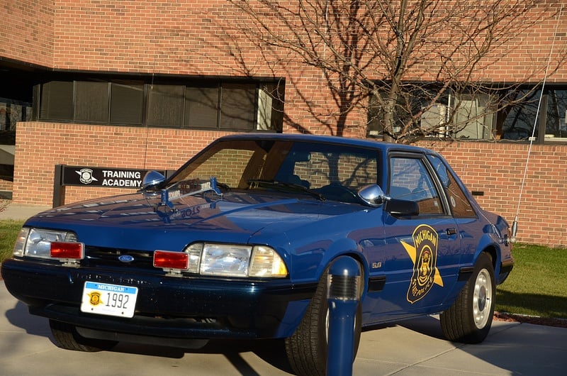 Blue Ford Mustang cop car