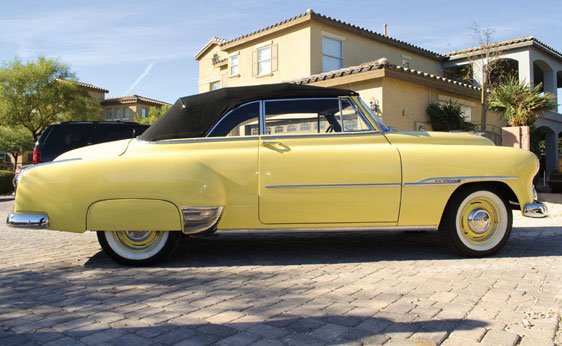 A yellow 1951 Chevrolet Styline DeLuxe, one of Steve McQueen's cars that was also owned by Rick Harrison of Pawn Stars