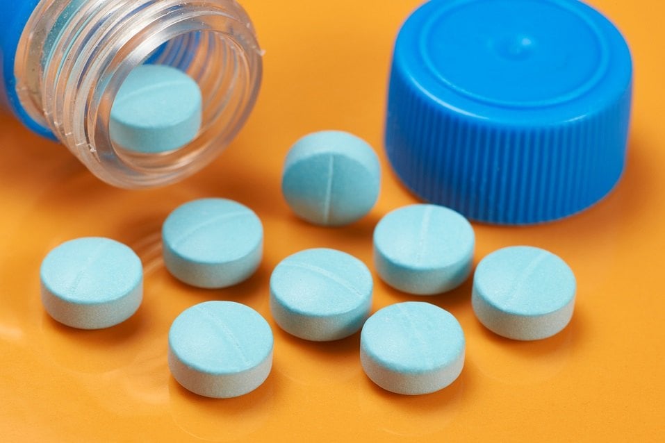 medicinal tablets with blue container