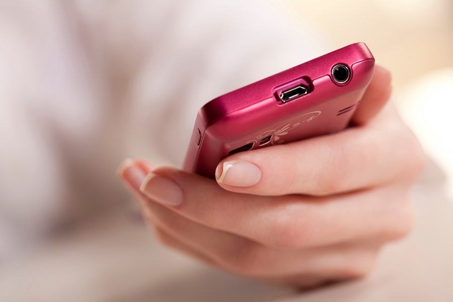 Woman holding a smartphone