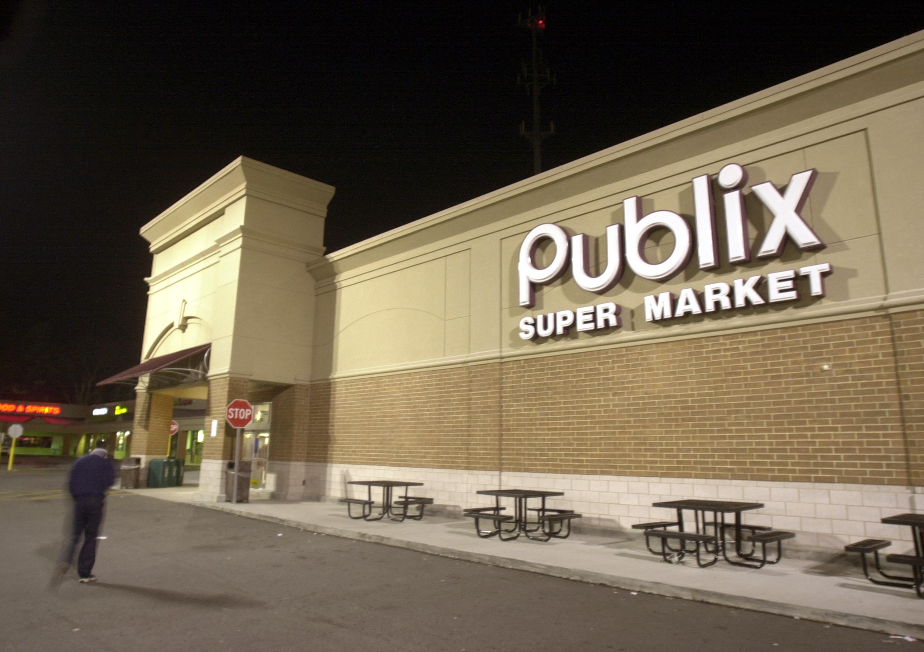 A worker strolls into a Publix Super Market
