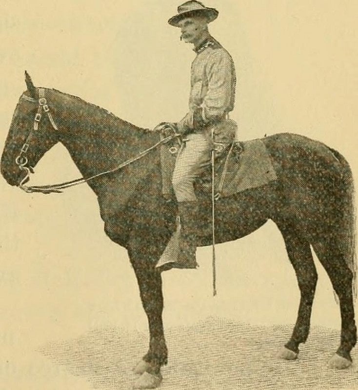 Theodore Roosevelt Jr. sits atop a horse