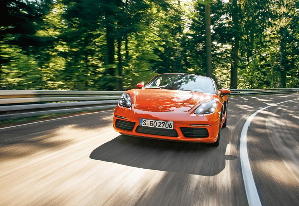 Rad shot of orange 2017 Porsche Boxster