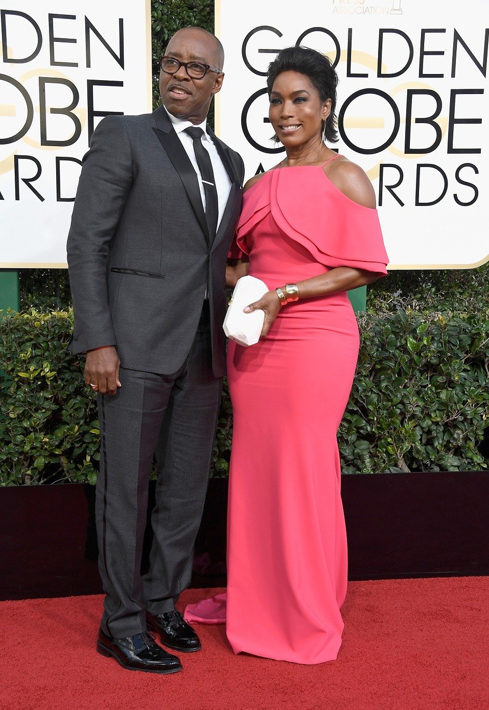 Actors Courtney B. Vance (L) and Angela Bassett attend the 74th Annual Golden Globe Awards