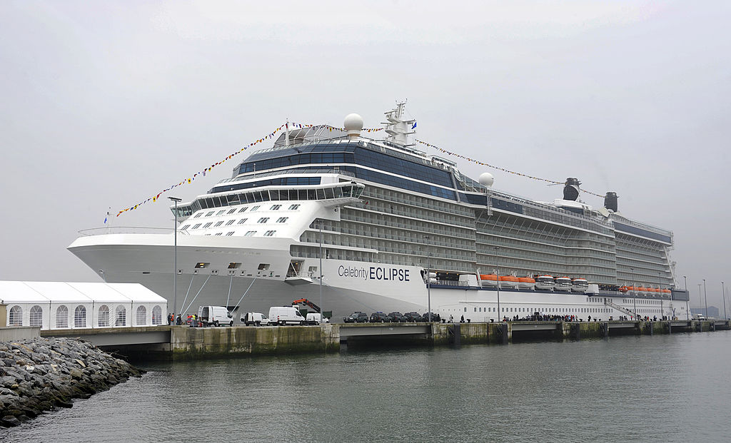 Tourists board the Celebrity Eclipse cruiser