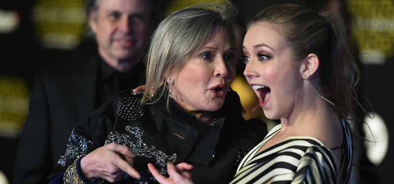 Carrie Fisher posing playfully with Billie Lourd