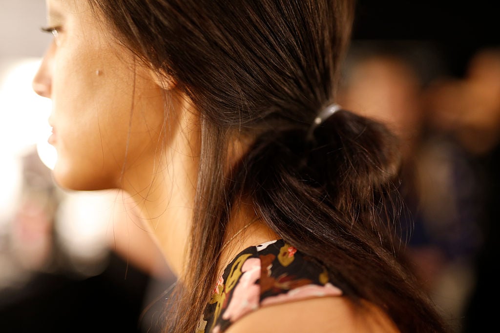 A detail shot of a Models hair is seen backstage ahead of the Dimitri show during the Mercedes-Benz Fashion Week