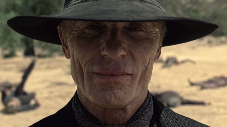 Close up of Ed Harris's face in Westworld