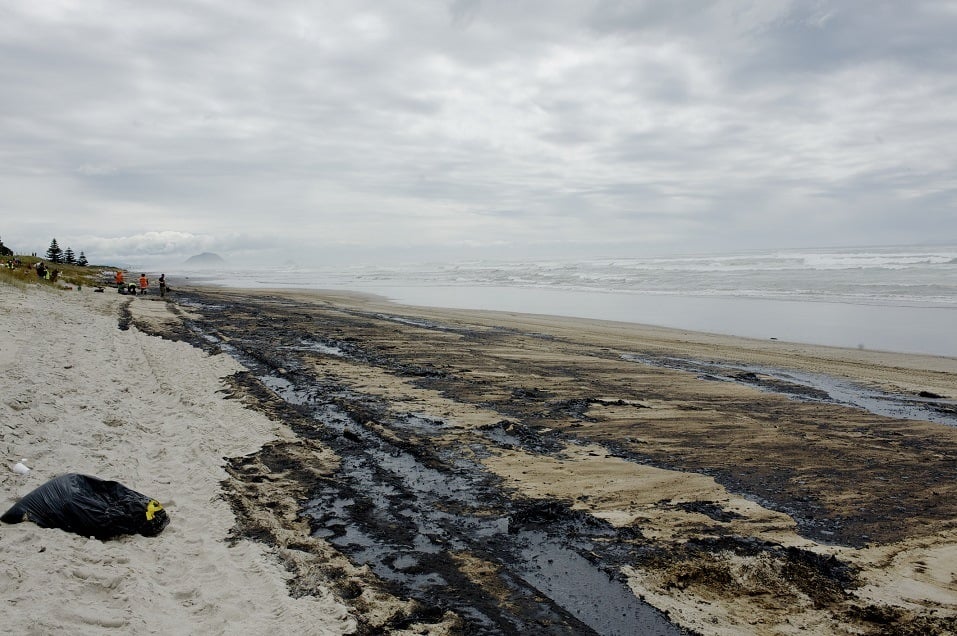 oil covers Papamoa beach in New Zealand