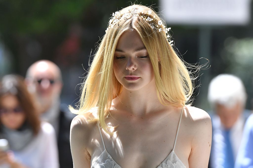 Actress Elle Fanning arrives at a photocall to promote the movie The Neon Demon