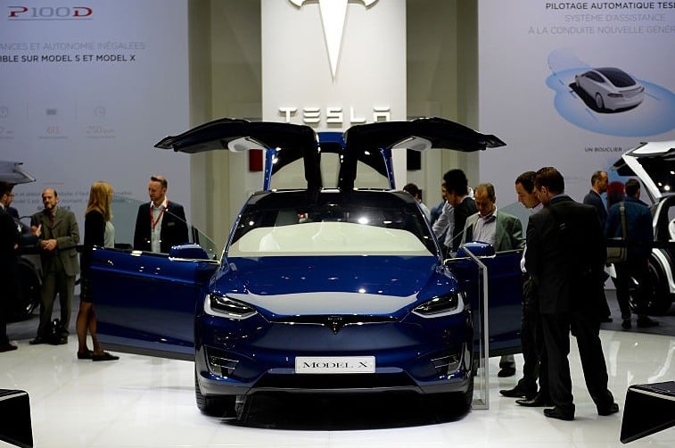 Tesla cars are presented during press days of the Paris motor Show on September 30, 2016. / AFP / ERIC PIERMONT (Photo credit should read ERIC PIERMONT/AFP/Getty Images)