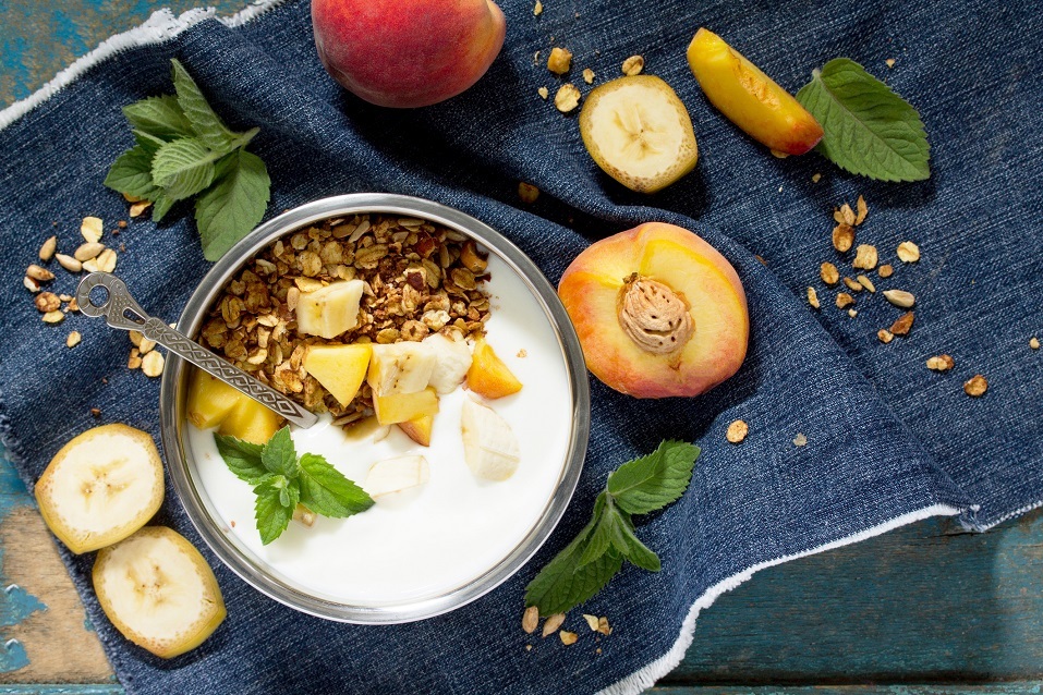 Healthy breakfast of muesli, berries with yogurt