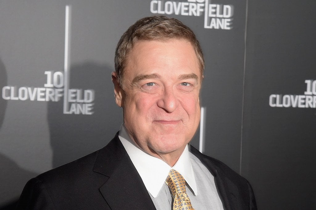 John Goodman smiling and posing on a red carpet. John Goodman smiling and posing on a red carpet.