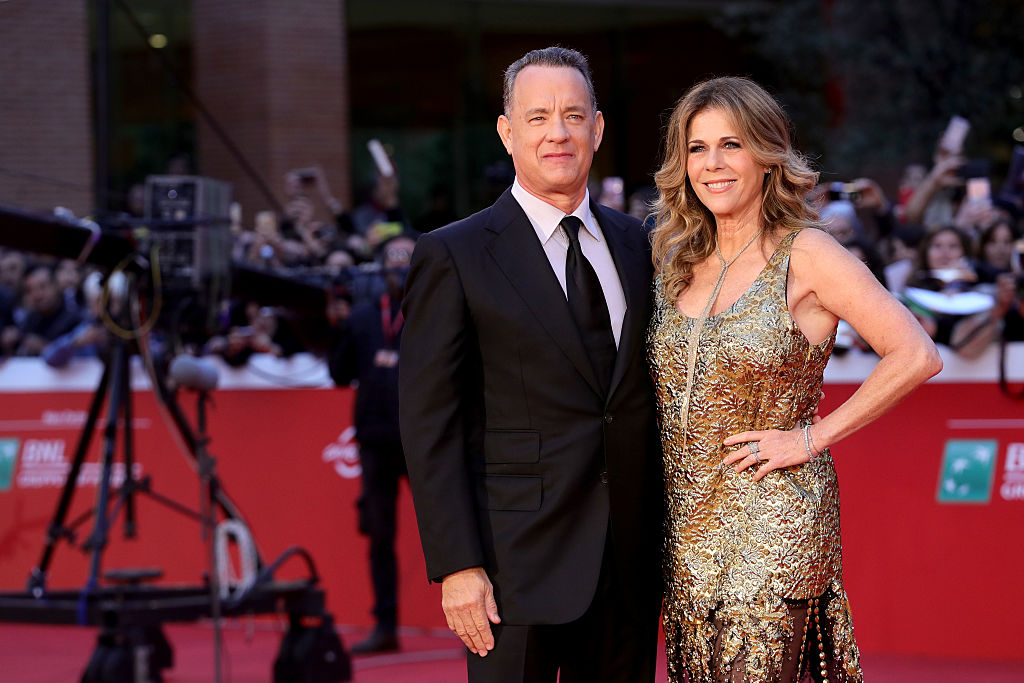 Tom Hanks and Rita Wilson walk a red carpet
