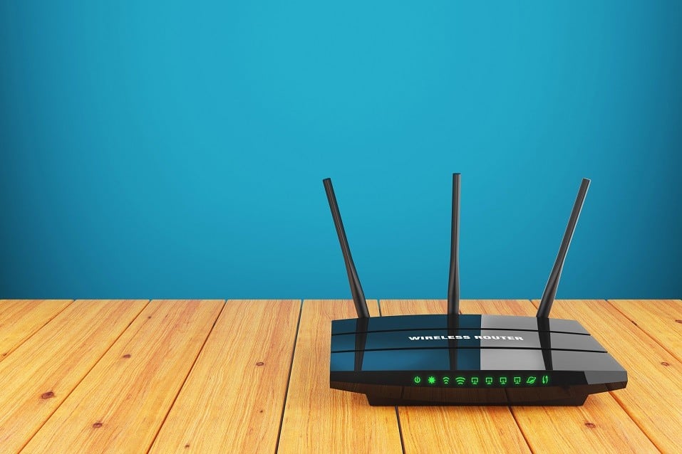 Wi-Fi wireless router on a wooden table