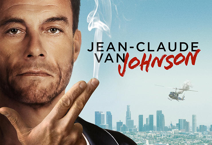 Jean Claude holds up his fingers like a gun