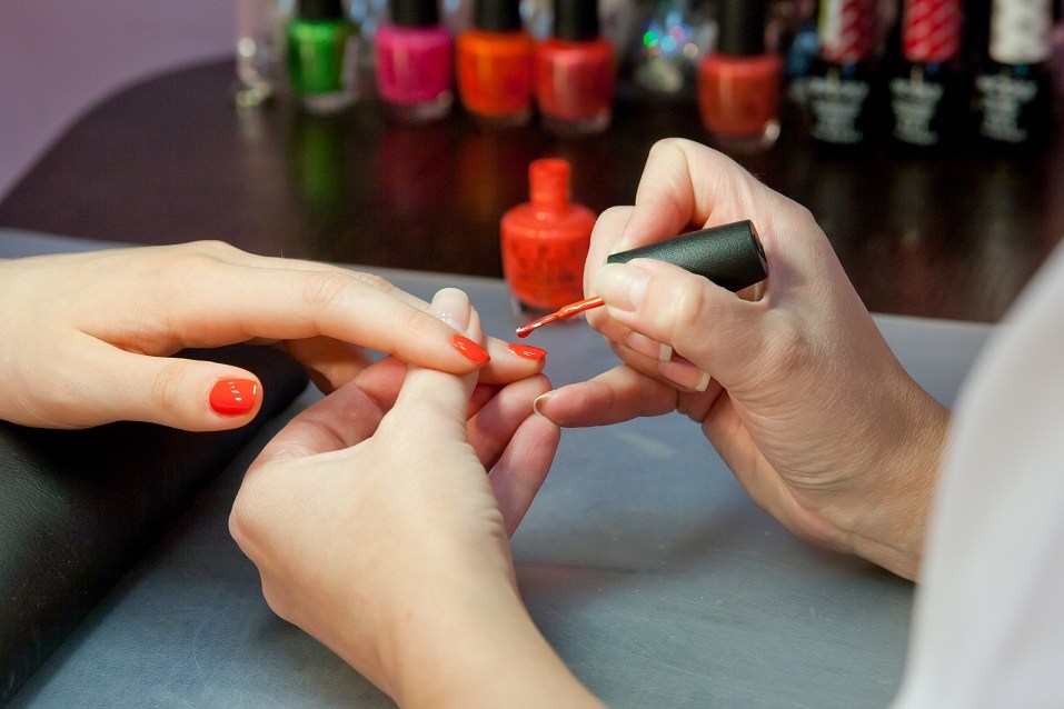 hands of the manicurist and the client