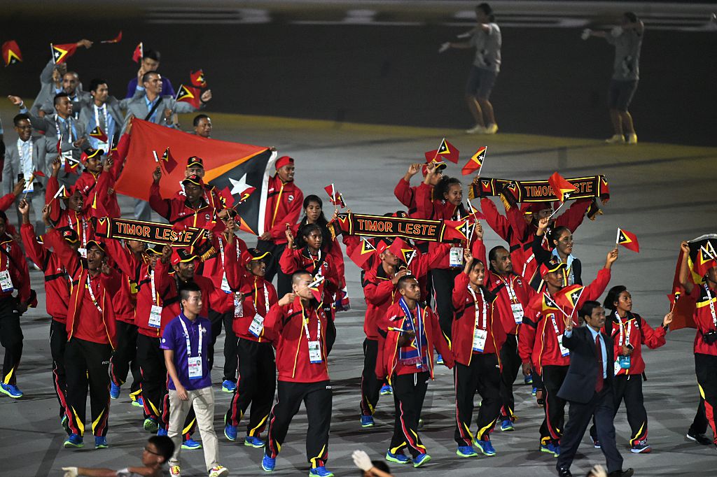 Athletes from East Timor march during at the opening ceremony of the biennial Southeast Asian (SEA) Games