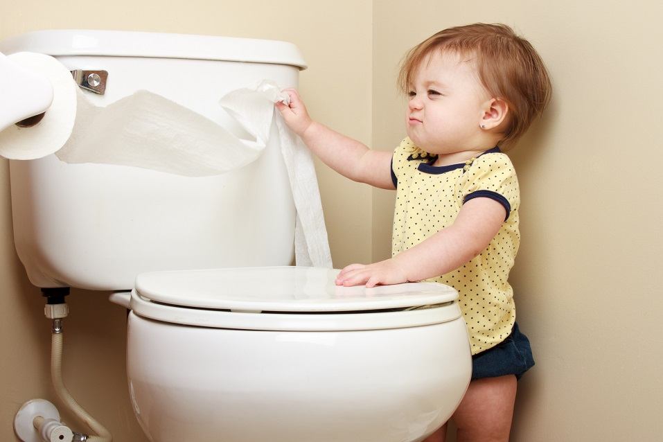 baby pulling toilet paper