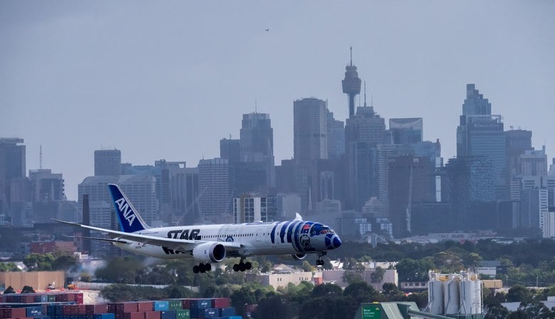 An airplane lands at an airport