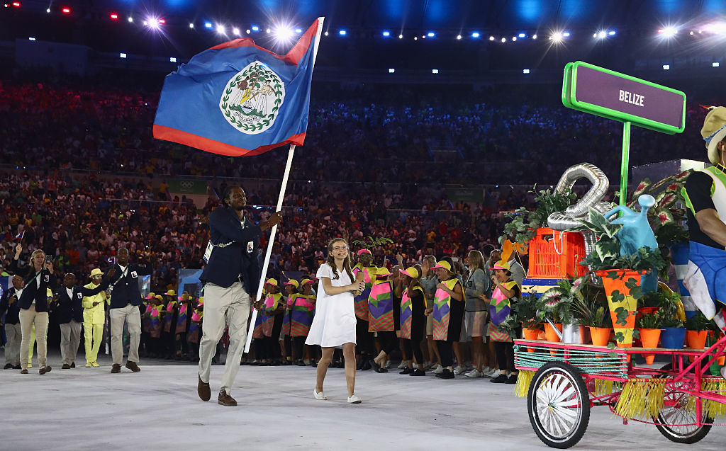 Brandon Jones of Belize carries the flag