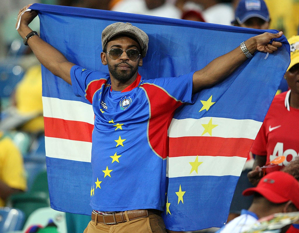 A Cape Verde fan holds a flag aloft during the 2013 African Cup of Nations