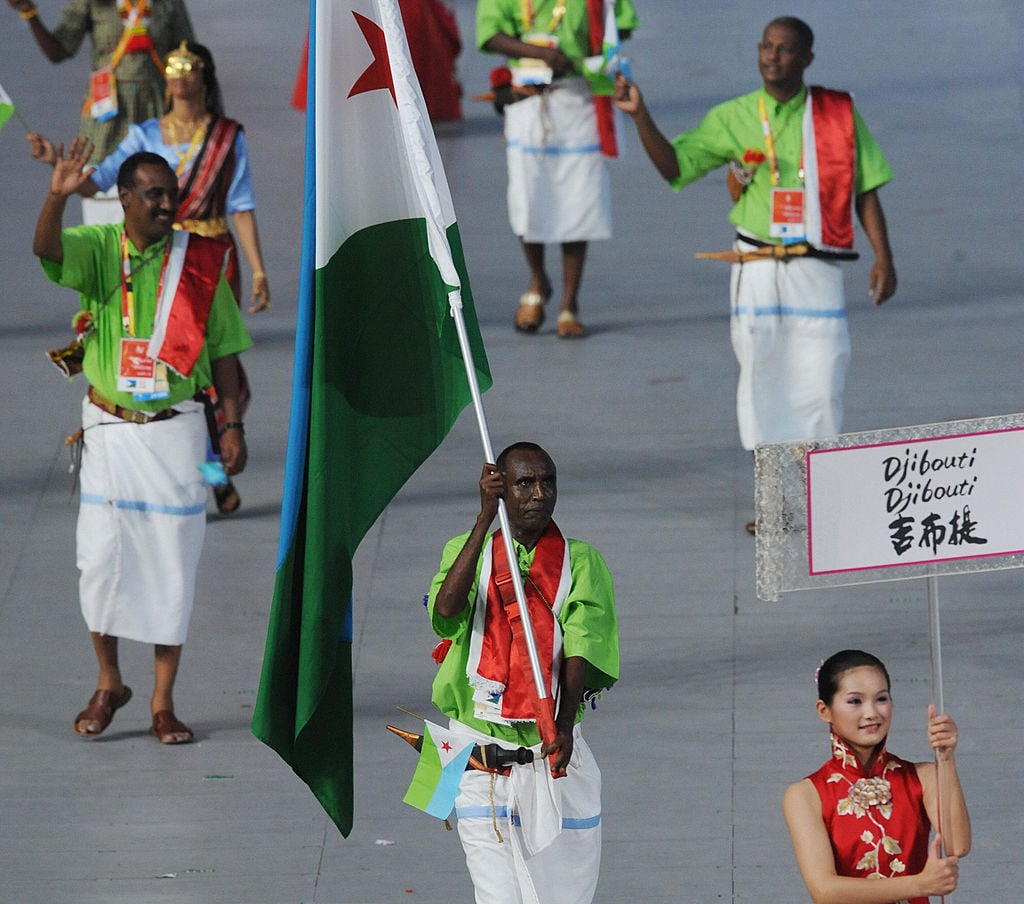 Salah Houssein Ahmed Djibouti's flag bearer parades in front of his delegation