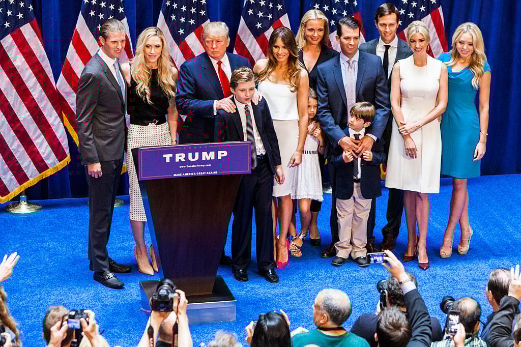 Eric Trump, Lara Yunaska Trump, Donald Trump, Barron Trump, Melania Trump, Vanessa Haydon Trump, Kai Madison Trump, Donald Trump Jr., Donald John Trump III, Jared Kushner, Ivanka Trump, and Tiffany Trump pose for photos