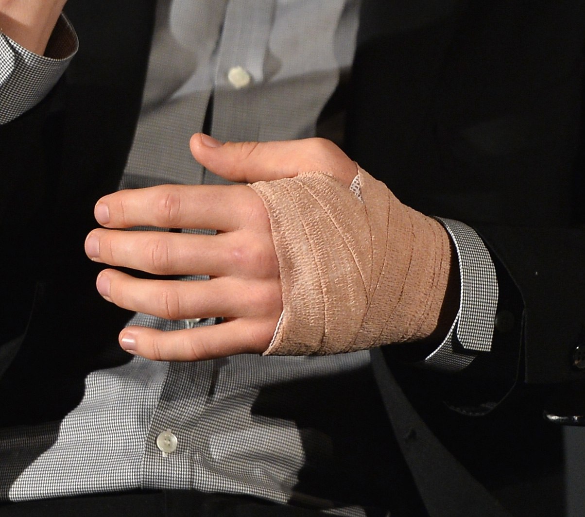 Man with his hand tied up