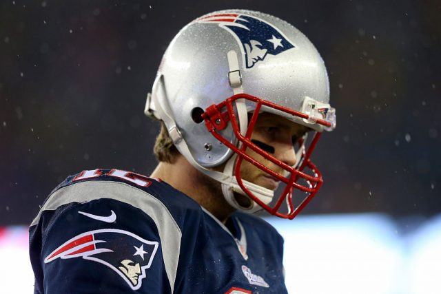 Tom Brady on field while it is snowing Tom Brady on field while it is snowing