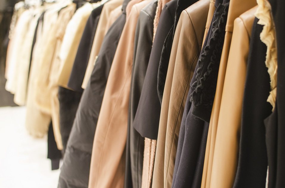 Hanging clothes in a fashion store