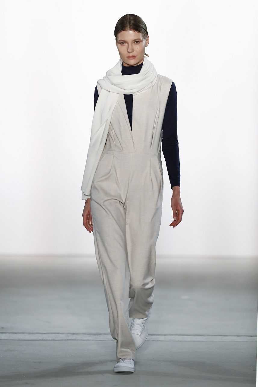 A model walks the runway at the Hien Le show
