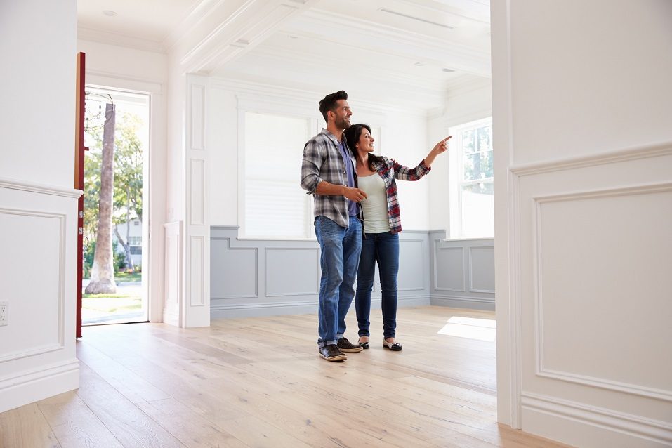 Couple views empty home