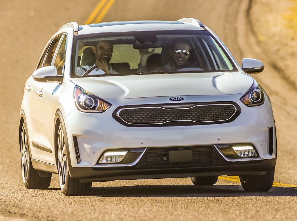 The author, left, and his driving partner explore the limits of Niro's suspension compression