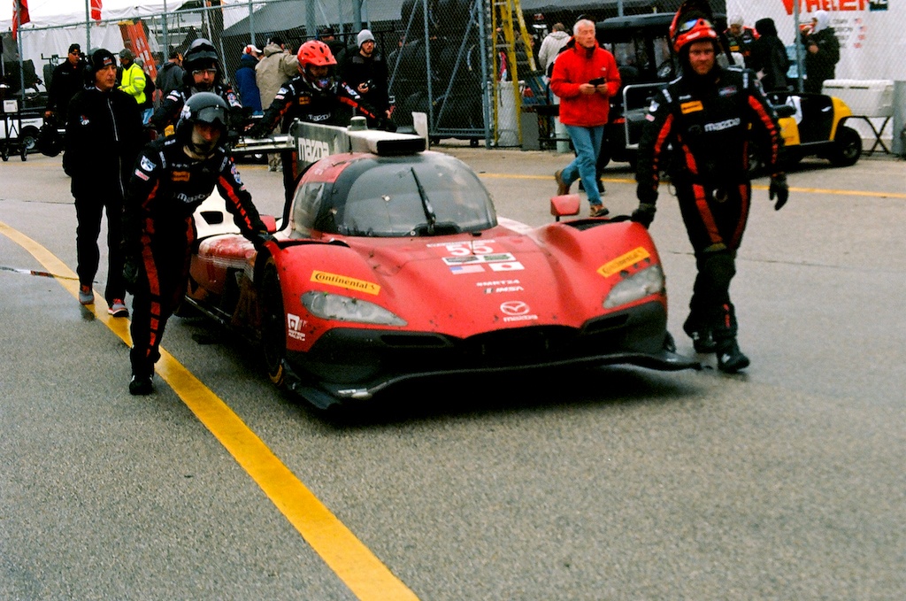 The long walk from the pits to the garage