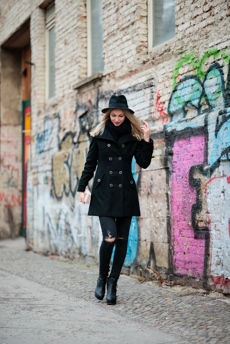 Sandra Schild, wearing Zara, poses for photos during the Mercedes-Benz Fashion Week