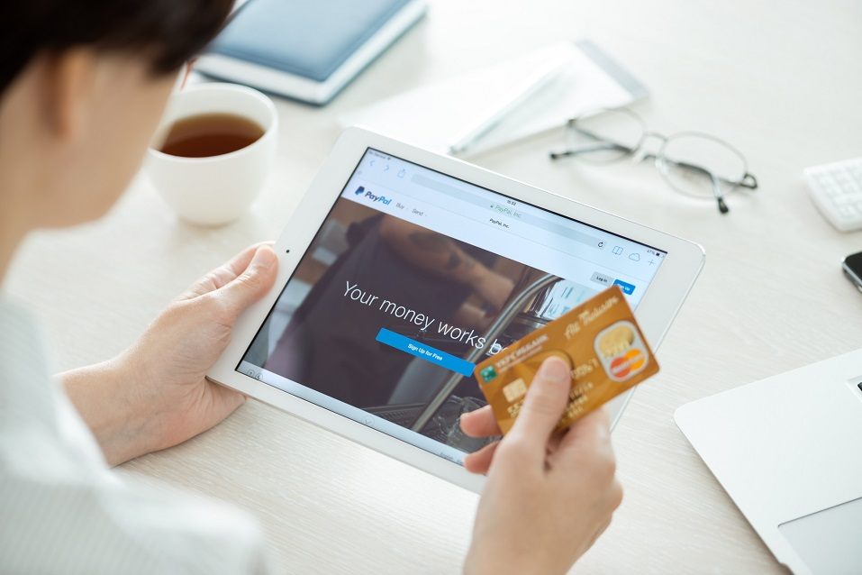 Apple iPad Air with Paypal website on a screen