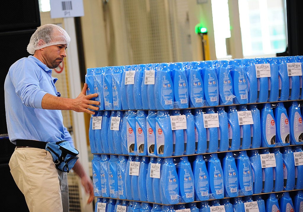 A Romanian worker surveys the packing line at the new Procter & Gamble plant